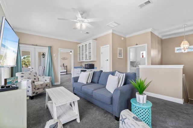 34 Opal Cv, Miramar Beach, FL 32550 - carpeted living room with french doors, a ceiling fan, healthy amount of natural light, ornamental molding, and baseboards