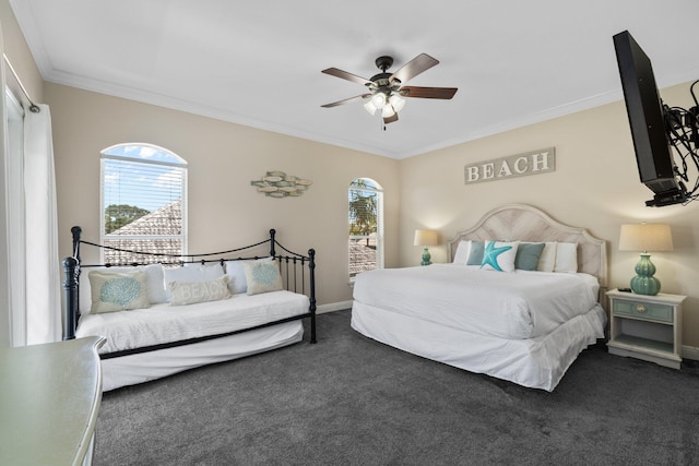 34 Opal Cv, Miramar Beach, FL 32550 - bedroom with dark carpet, ornamental molding, baseboards, and ceiling fan