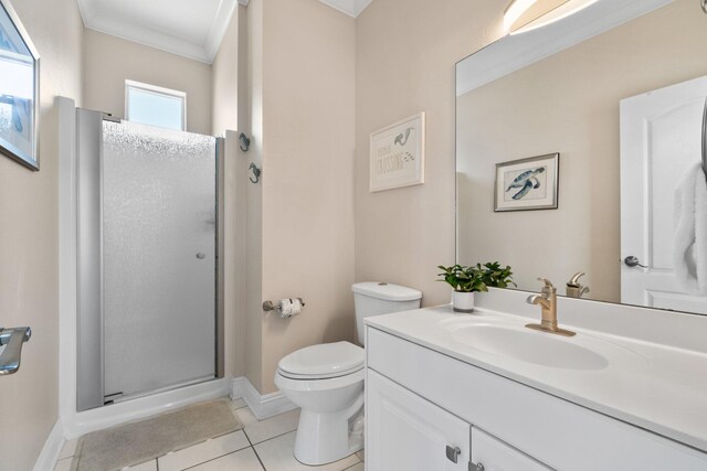 34 Opal Cv, Miramar Beach, FL 32550 - bathroom featuring vanity, toilet, a stall shower, tile patterned floors, and baseboards
