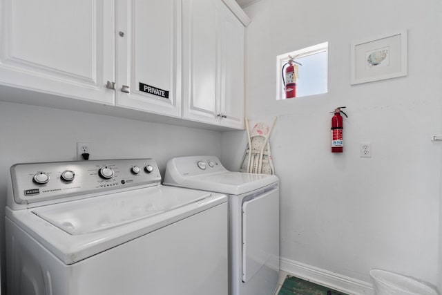 34 Opal Cv, Miramar Beach, FL 32550 - washroom featuring cabinet space, washing machine and clothes dryer, and baseboards