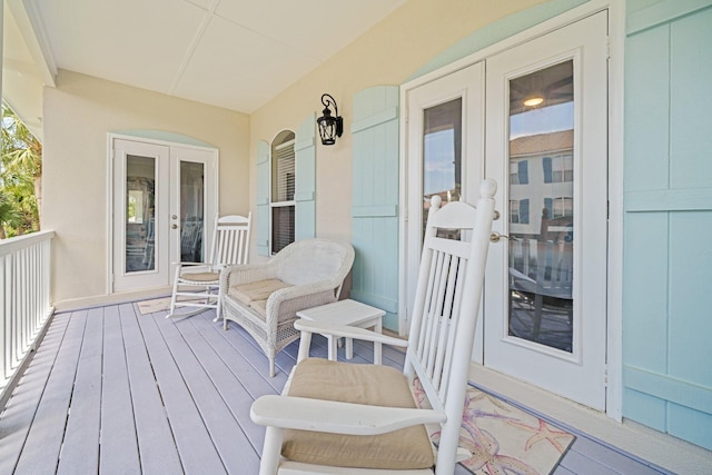 34 Opal Cv, Miramar Beach, FL 32550 - wooden terrace with french doors