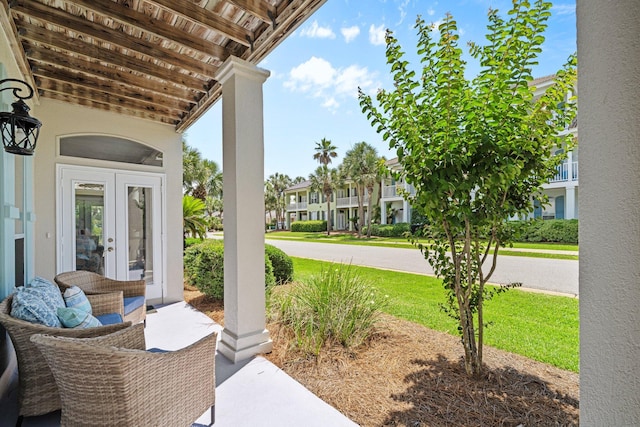 34 Opal Cv, Miramar Beach, FL 32550 - view of patio with french doors and a residential view