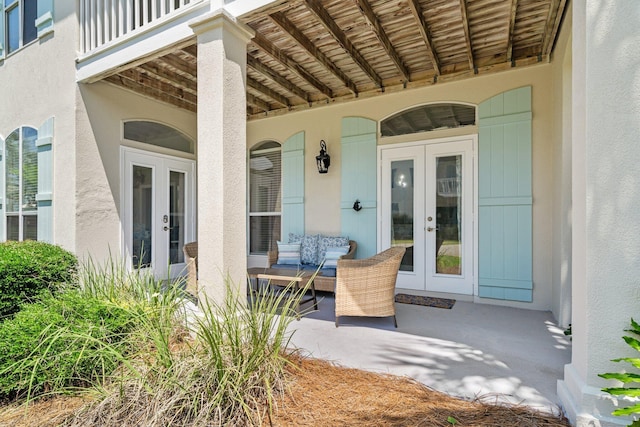 34 Opal Cv, Miramar Beach, FL 32550 - covered porch featuring french doors