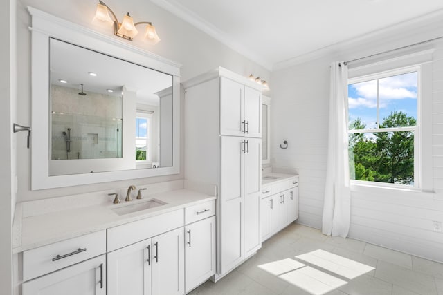 164 Clipper St, Inlet Beach, FL 32461 - full bathroom with two vanities, a shower stall, and crown molding