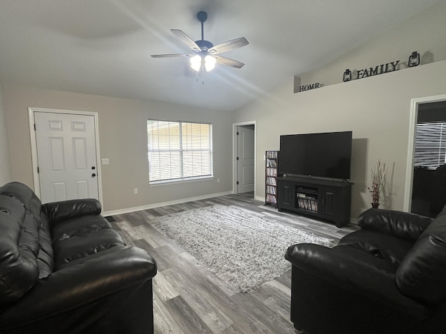 8945 Bluebell St, Milton, FL 32583 - living area featuring a ceiling fan, wood finished floors, lofted ceiling, and baseboards