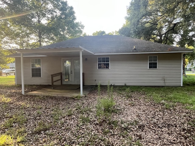 8945 Bluebell St, Milton, FL 32583 - back of house with french doors and a patio area