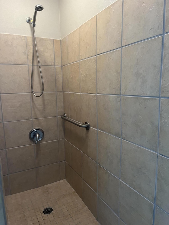8945 Bluebell St, Milton, FL 32583 - bathroom with a tile shower