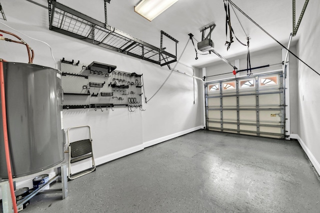 526 Valparaiso Pkwy Unit B, Valparaiso, FL 32580 - garage with baseboards, a garage door opener, and water heater