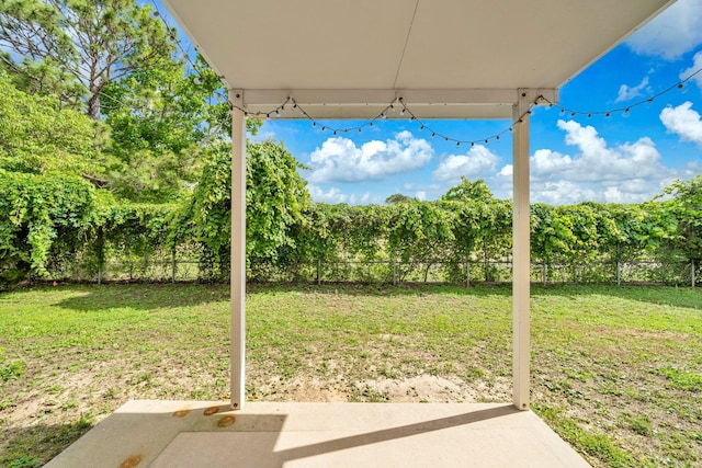 526 Valparaiso Pkwy Unit B, Valparaiso, FL 32580 - view of yard featuring a patio area and view of scattered trees