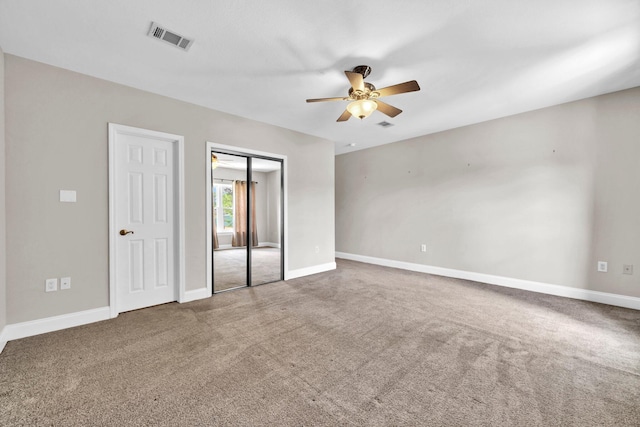526 Valparaiso Pkwy Unit B, Valparaiso, FL 32580 - unfurnished bedroom with carpet, baseboards, a ceiling fan, and a closet