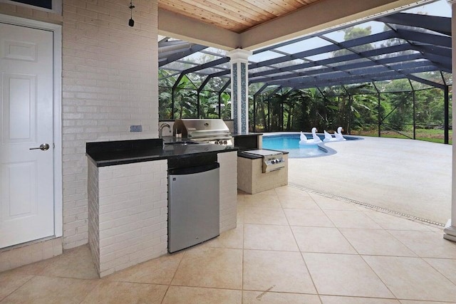 302 Sand Myrtle Trl, Destin, FL 32541 - view of patio / terrace with an outdoor kitchen, an outdoor pool, and glass enclosure
