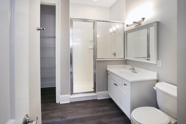 302 Sand Myrtle Trl, Destin, FL 32541 - bathroom with a shower stall, vanity, and wood finished floors