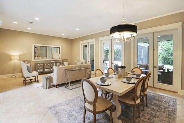 302 Sand Myrtle Trl, Destin, FL 32541 - dining room featuring french doors, light tile patterned floors, recessed lighting, a chandelier, and crown molding