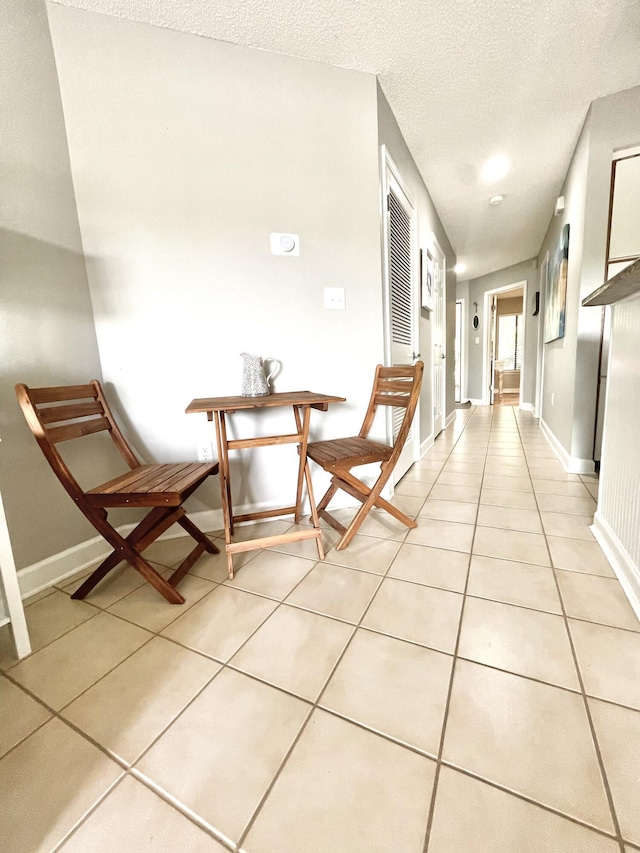 305 Southlake Ct Unit 305, Niceville, FL 32578 - hall with light tile patterned floors and baseboards