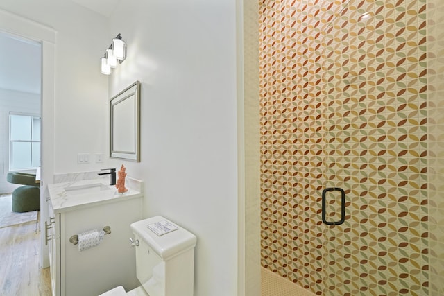 127 Avalon Blvd, Miramar Beach, FL 32550 - full bath featuring vanity, a stall shower, and wood finished floors
