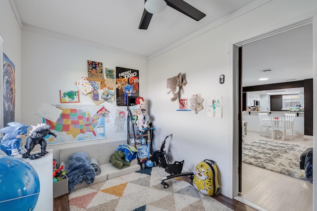 16 Court Dr, Destin, FL 32541 - bedroom with crown molding, wood finished floors, and ceiling fan