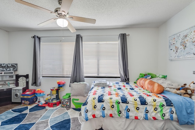 16 Court Dr, Destin, FL 32541 - bedroom featuring a textured ceiling and ceiling fan