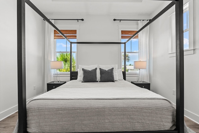 11 E Pine Lands Loop Unit A, Inlet Beach, FL 32461 - bedroom featuring dark wood-type flooring and baseboards