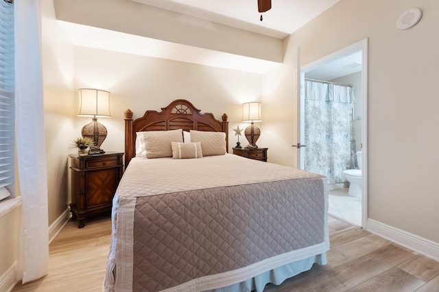 112 Seascape Dr Unit 1807, Miramar Beach, FL 32550 - bedroom featuring light wood finished floors, ensuite bath, baseboards, and ceiling fan