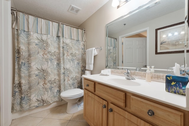 112 Seascape Dr Unit 1807, Miramar Beach, FL 32550 - bathroom with tile patterned floors, vanity, toilet, and a shower with curtain