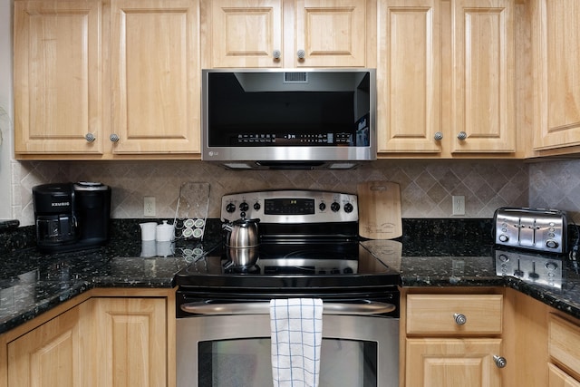 112 Seascape Dr Unit 1807, Miramar Beach, FL 32550 - kitchen with stainless steel appliances, light brown cabinets, and decorative backsplash