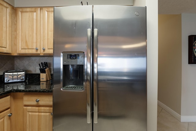 112 Seascape Dr Unit 1807, Miramar Beach, FL 32550 - kitchen with stainless steel refrigerator with ice dispenser, decorative backsplash, light brown cabinetry, baseboards, and light tile patterned flooring