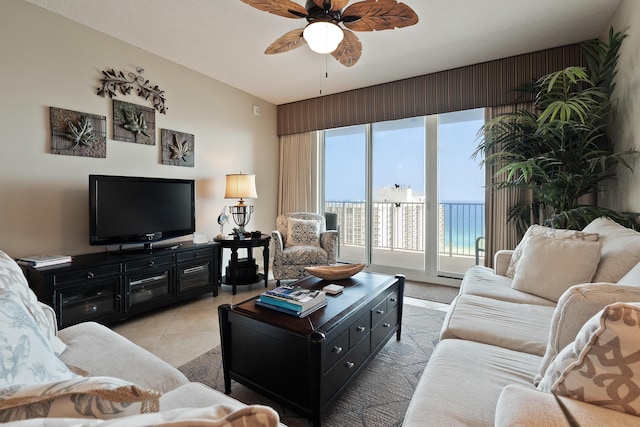 112 Seascape Dr Unit 1807, Miramar Beach, FL 32550 - living room with ceiling fan and light tile patterned floors
