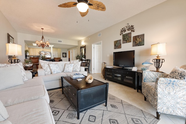 112 Seascape Dr Unit 1807, Miramar Beach, FL 32550 - living room with light tile patterned flooring, a chandelier, and a ceiling fan