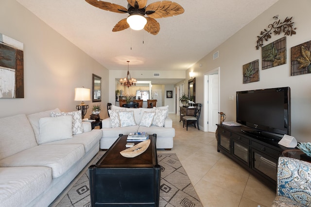 112 Seascape Dr Unit 1807, Miramar Beach, FL 32550 - living room with a chandelier, a ceiling fan, and light tile patterned floors