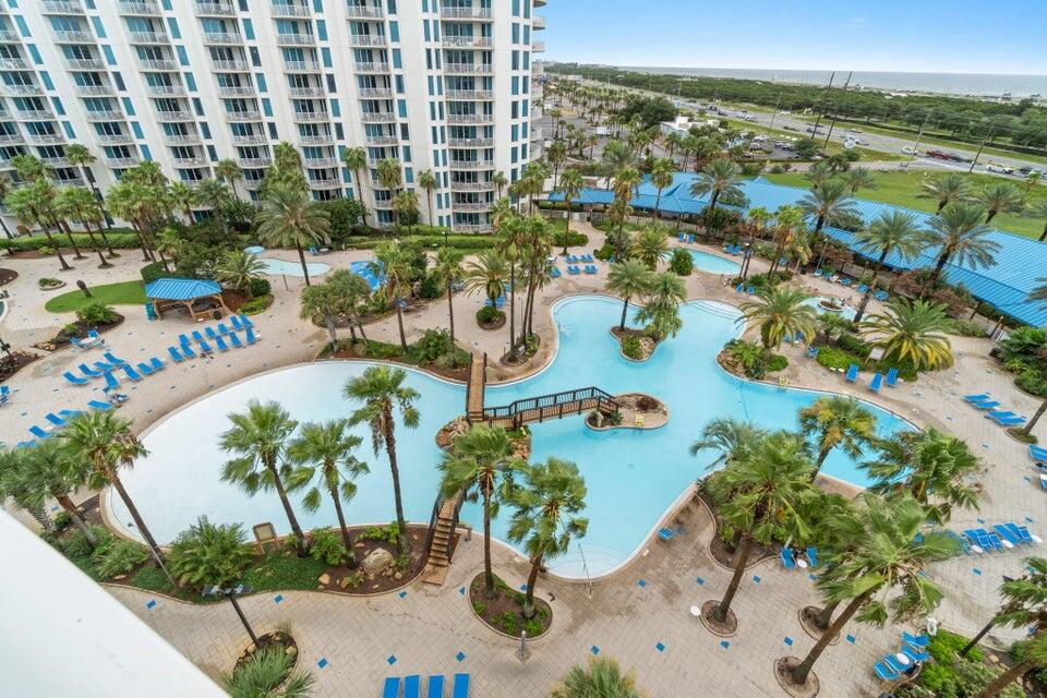 4207 Indian Bayou Trl Unit 2815, Destin, FL 32541 - drone / aerial view of a nearby body of water, apartment complex, and a pool