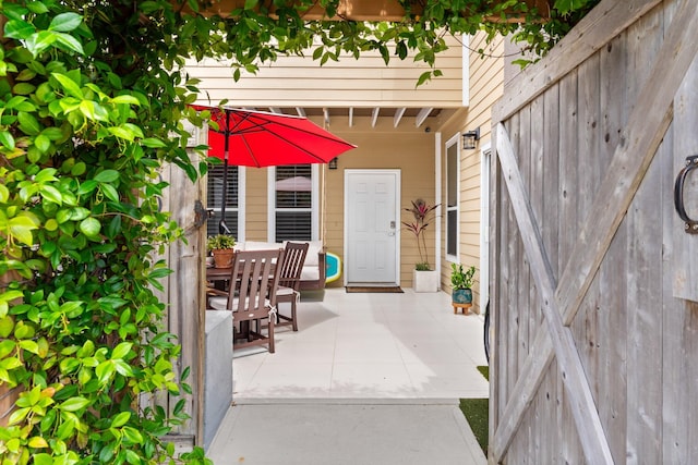 3695 Scenic Highway 98 Unit 1002, Destin, FL 32541 - entrance to property with a patio and outdoor dining space