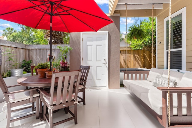 3695 Scenic Highway 98 Unit 1002, Destin, FL 32541 - fenced backyard with outdoor lounge area, outdoor dining space, a patio area, and a storage shed