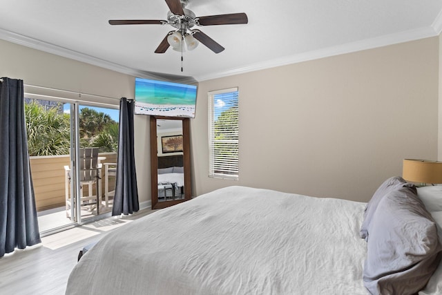 3695 Scenic Highway 98 Unit 1002, Destin, FL 32541 - bedroom featuring ornamental molding, access to outside, wood finished floors, multiple windows, and ceiling fan