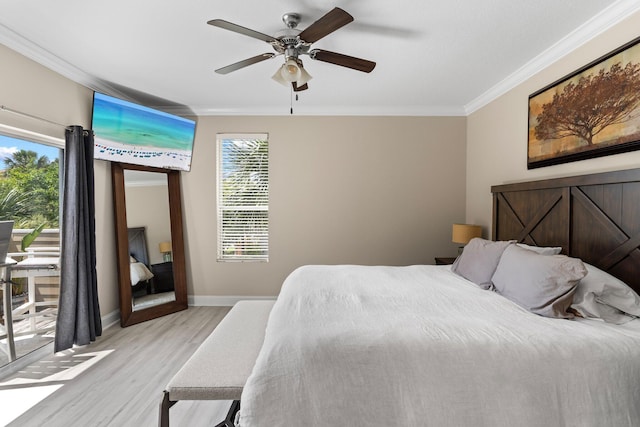3695 Scenic Highway 98 Unit 1002, Destin, FL 32541 - bedroom featuring light wood-type flooring, crown molding, access to outside, baseboards, and ceiling fan