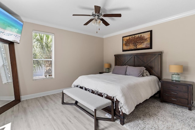 3695 Scenic Highway 98 Unit 1002, Destin, FL 32541 - bedroom featuring ornamental molding, light wood-type flooring, baseboards, and ceiling fan