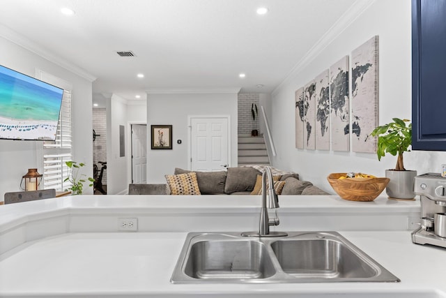 3695 Scenic Highway 98 Unit 1002, Destin, FL 32541 - kitchen with a sink, crown molding, light countertops, blue cabinetry, and recessed lighting