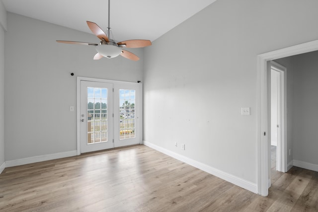 4507 Furling Ln Unit 302, Destin, FL 32541 - spare room featuring wood finished floors, ceiling fan, baseboards, and high vaulted ceiling