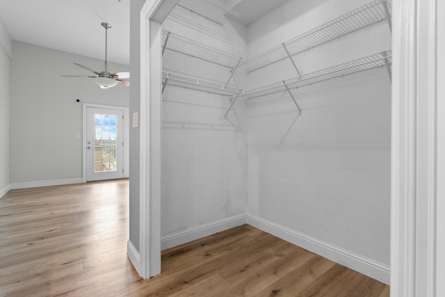 4507 Furling Ln Unit 302, Destin, FL 32541 - spacious closet featuring light wood-style floors and a ceiling fan