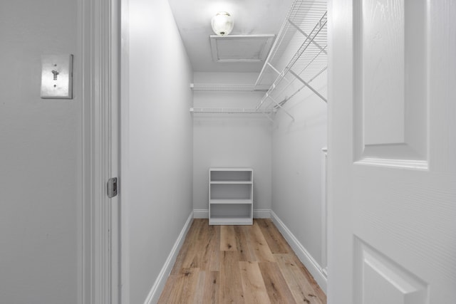 4507 Furling Ln Unit 302, Destin, FL 32541 - spacious closet with light wood finished floors
