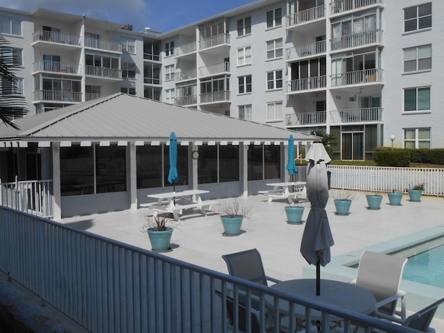 3857 Indian Trl Unit 203, Destin, FL 32541 - view of swimming pool with a patio
