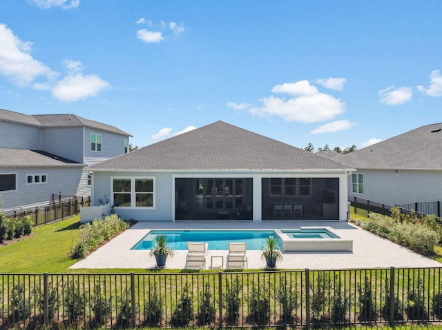 282 W Lafayette Rd, Inlet Beach, FL 32461 - rear view of house with a patio area, a fenced backyard, a shingled roof, a pool with connected hot tub, and a garage
