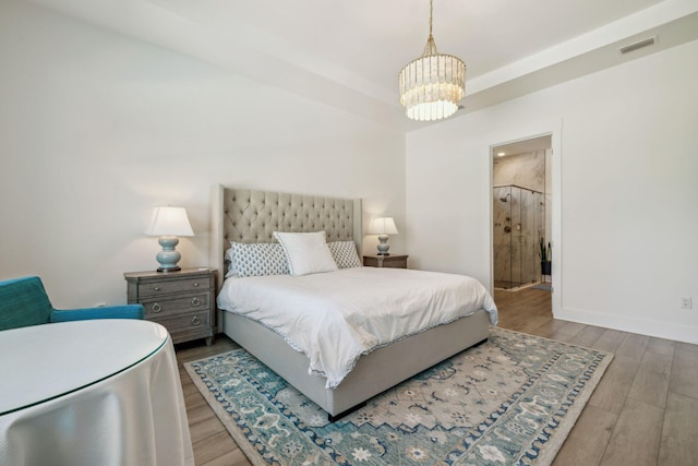 282 W Lafayette Rd, Inlet Beach, FL 32461 - bedroom with a chandelier and wood finished floors
