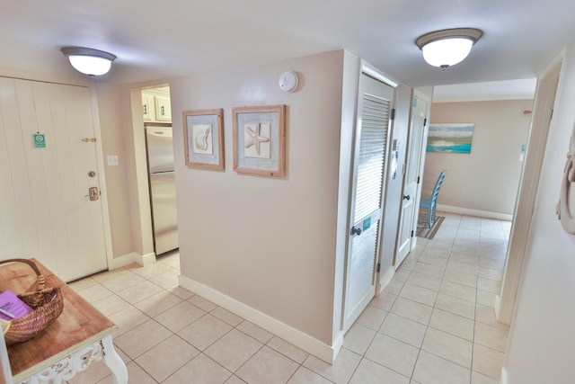196 N Driftwood Bay Unit 38A, Miramar Beach, FL 32550 - hall featuring light tile patterned flooring and baseboards