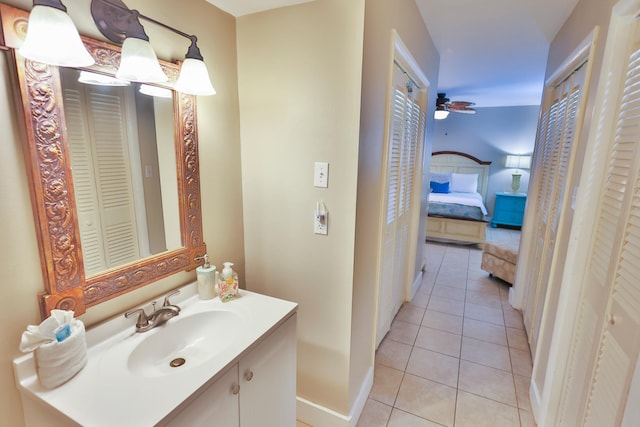 196 N Driftwood Bay Unit 38A, Miramar Beach, FL 32550 - ensuite bathroom featuring vanity, a closet, tile patterned flooring, and baseboards