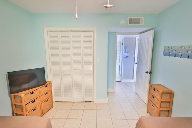 196 N Driftwood Bay Unit 38A, Miramar Beach, FL 32550 - bedroom with light tile patterned floors, a closet, and baseboards