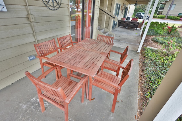 196 N Driftwood Bay Unit 38A, Miramar Beach, FL 32550 - view of patio / terrace with outdoor dining area and a ceiling fan