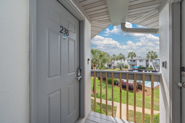 285 Payne St Unit 23B, Miramar Beach, FL 32550 - entrance to property with a residential view, a balcony, and stucco siding
