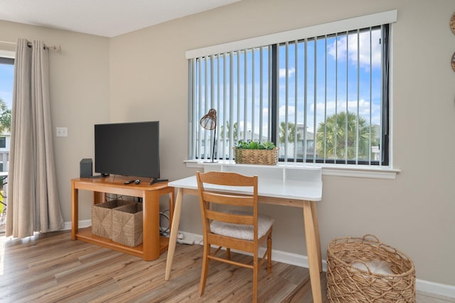 285 Payne St Unit 23B, Miramar Beach, FL 32550 - home office with wood finished floors and baseboards