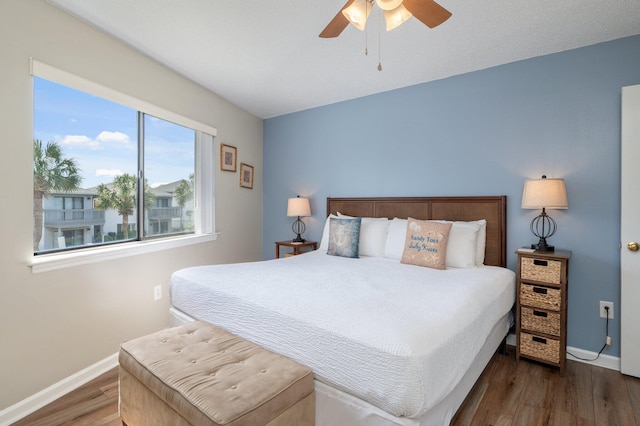 285 Payne St Unit 23B, Miramar Beach, FL 32550 - bedroom featuring wood finished floors, baseboards, and ceiling fan