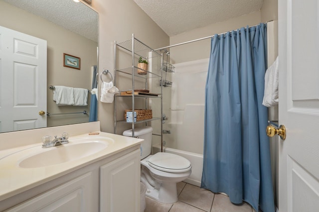 285 Payne St Unit 23B, Miramar Beach, FL 32550 - bathroom featuring a textured ceiling, tile patterned floors, shower / tub combo with curtain, toilet, and vanity